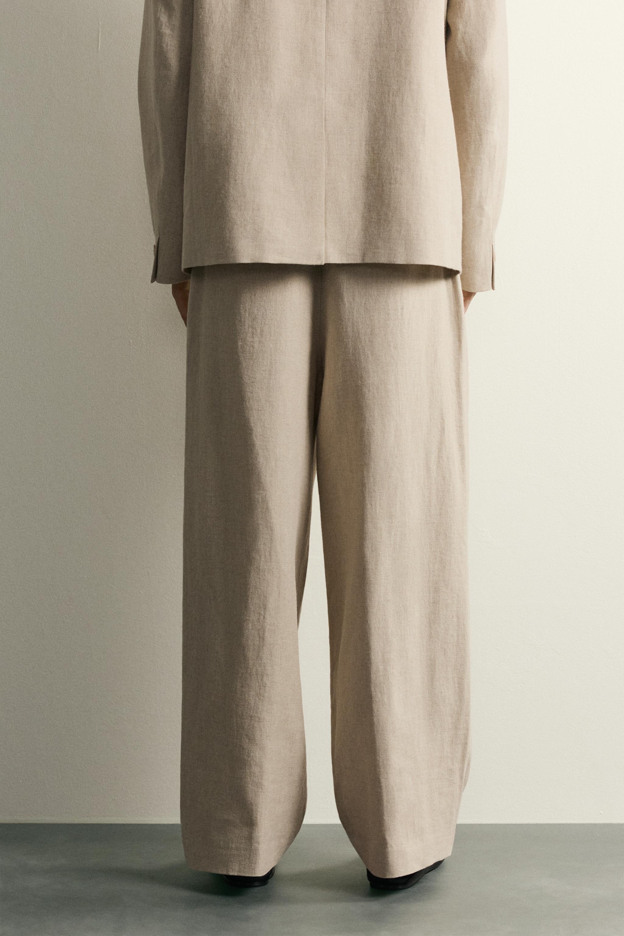 RELAXED FIT PLEATED SUIT PANTS